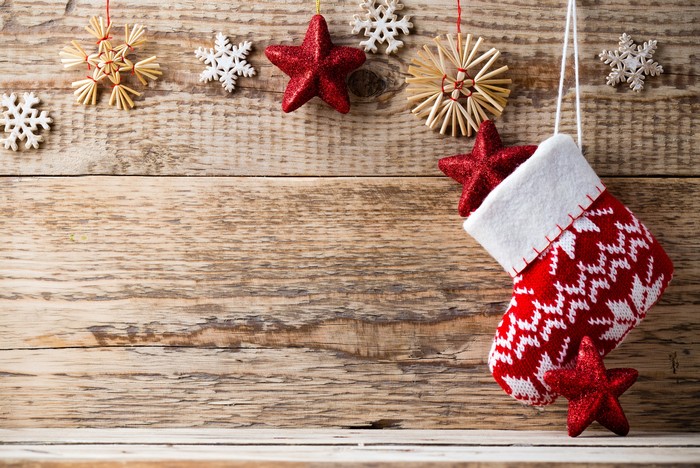 Christmas Stocking with Stars and Snowflakes on Wood