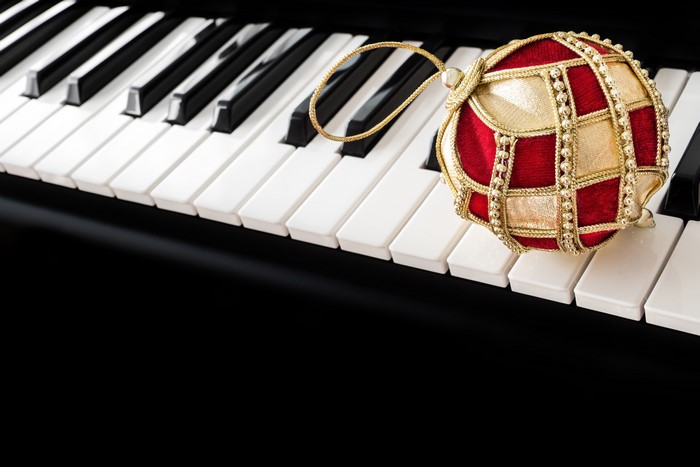 Christmas ornament on piano keys