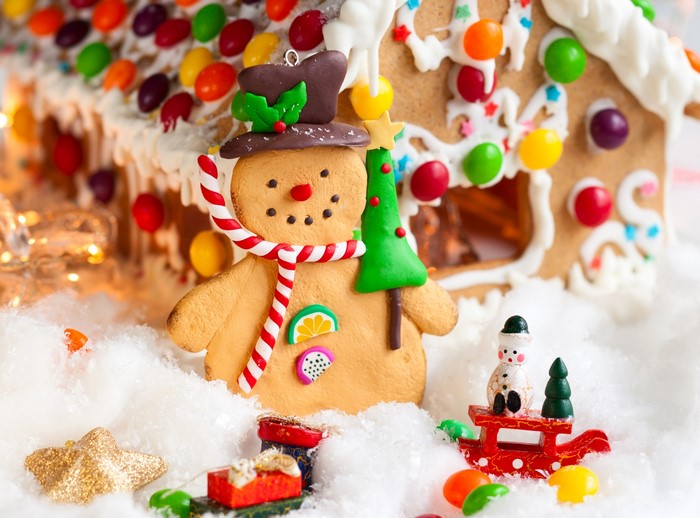 Gingerbread house with snowman and Christmas decorations