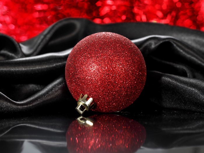 Red Glitter Christmas Ornament on Black Silk