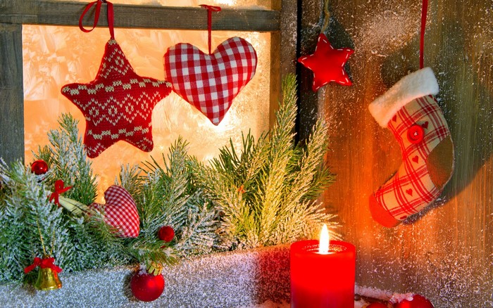 Christmas decorations with candle and pine branches