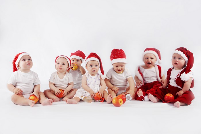 Babies in Santa Hats with Apples