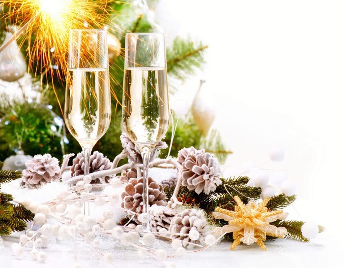 Champagne glasses with Christmas tree and sparkler