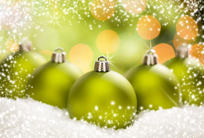 Christmas balls in snow with bokeh lights