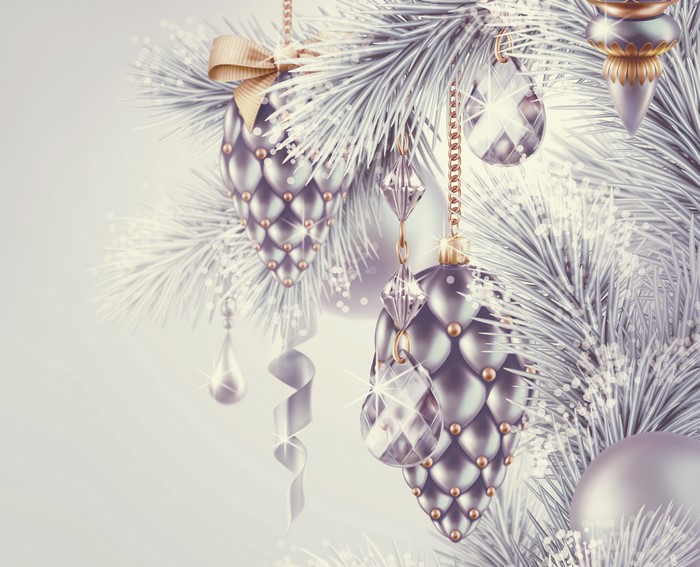 Christmas pine cones and ornaments on branches