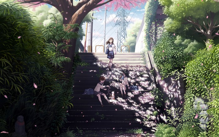 Schoolgirls on stairs with cherry blossoms