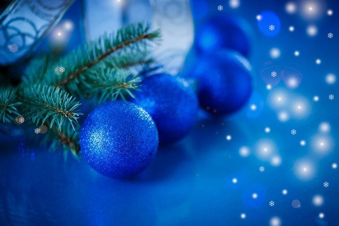 Christmas Ornaments and Pine Branches with Snowflakes