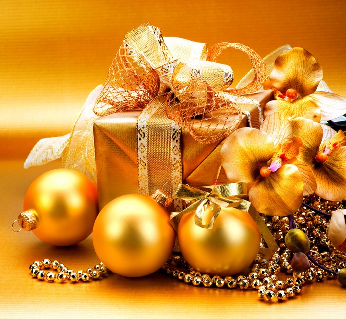 Golden Christmas Gift with Ornaments and Orchids