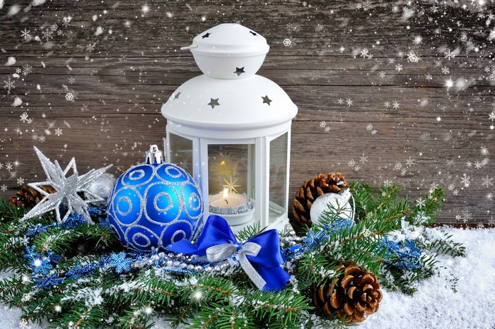 Christmas lantern with ornaments and pine cones