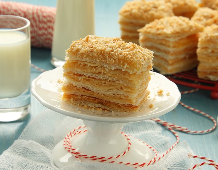 Napoleon cake slices with milk