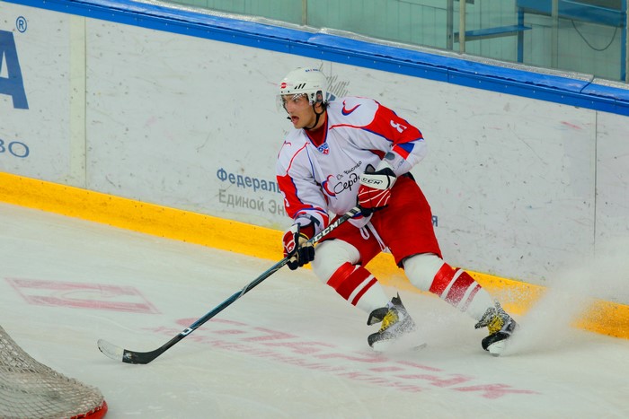 Hockey player in uniform on ice