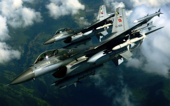 Two Turkish Air Force F-16 fighter jets in flight