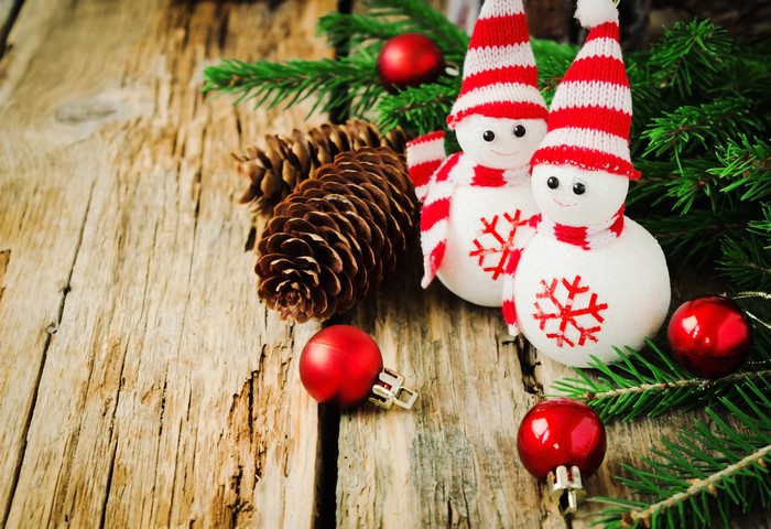 Festive Christmas Snowmen with Pine Cones and Branches