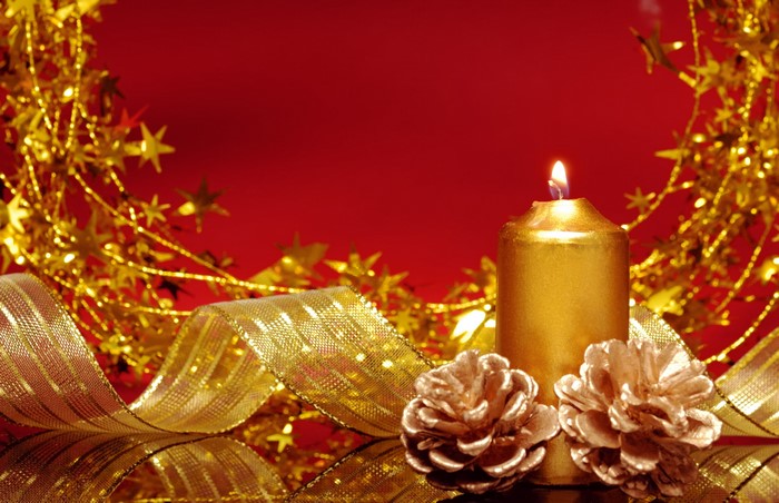 Golden Candle with Pine Cones and Ribbon
