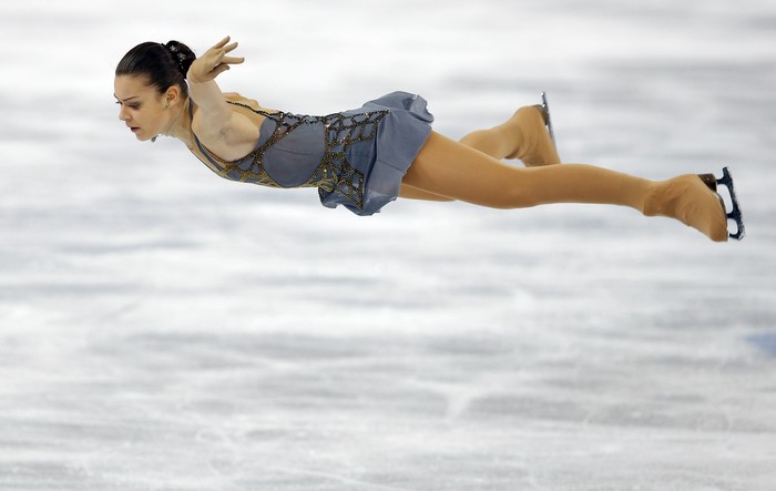 Adelina Sotnikova performing a jump on ice