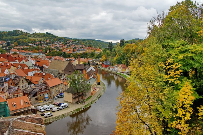 Town on a river in the Czech Republic during autumn