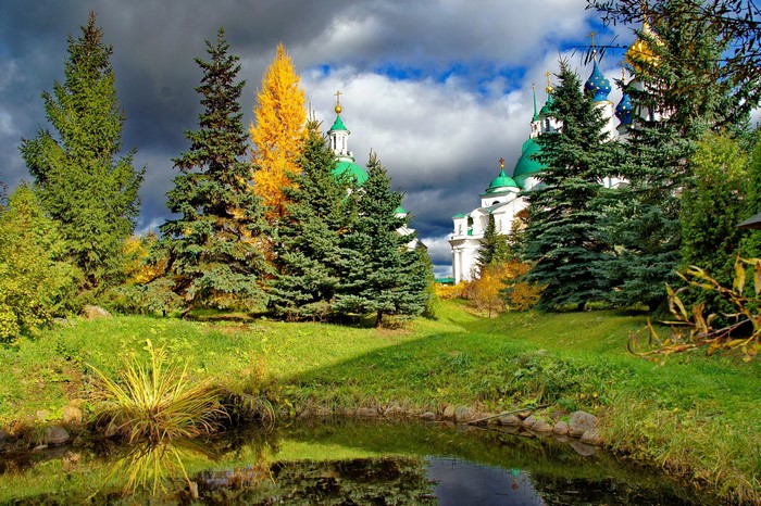 Russian Orthodox Church with Pond and Autumn Trees
