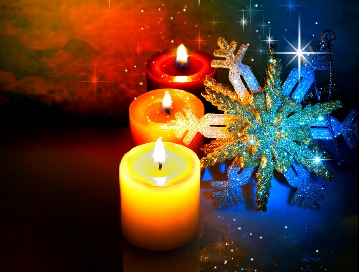 Christmas candles and snowflake decoration