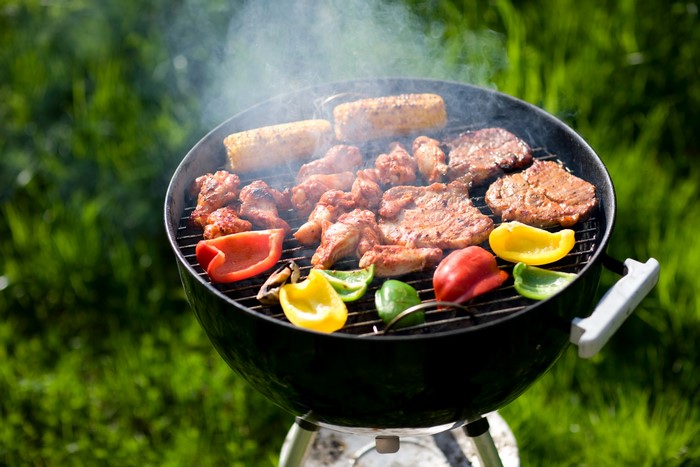 Barbecue with Meat, Corn, and Bell Peppers