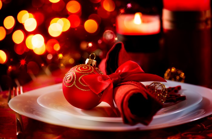 Christmas table setting with ornament and candle