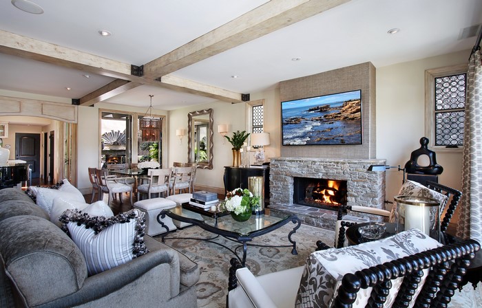 Living room with fireplace and dining area