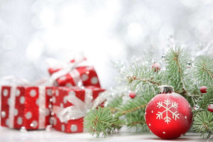 Christmas Gifts and Ornaments on Pine Branches