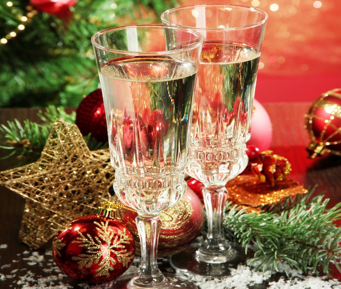 Champagne glasses with Christmas decorations