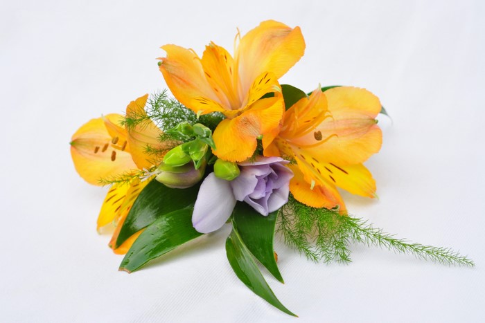 Orange Alstroemeria and Purple Eustoma Boutonniere