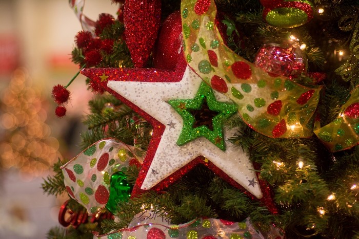 Christmas tree with star ornaments and ribbon