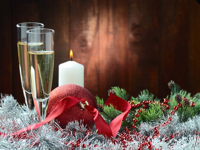 Christmas Celebration with Champagne and Candle