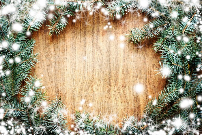 Christmas Fir Branches with Snowflakes on Wood