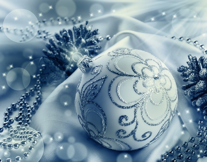 Christmas ornaments and beads on satin