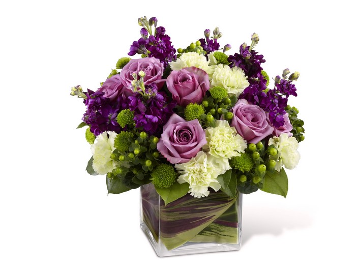 Purple Roses and Carnations in a Glass Vase