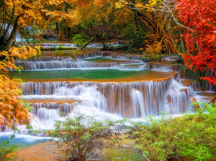 Tiered Waterfalls in Autumn Forest, Thailand