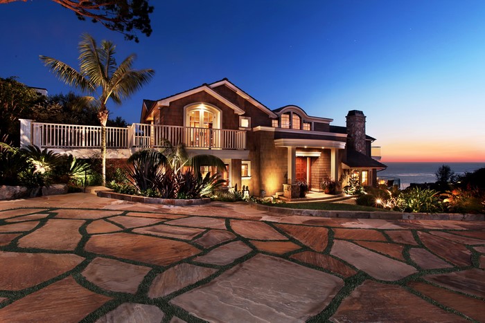 Luxury house with ocean view at dusk