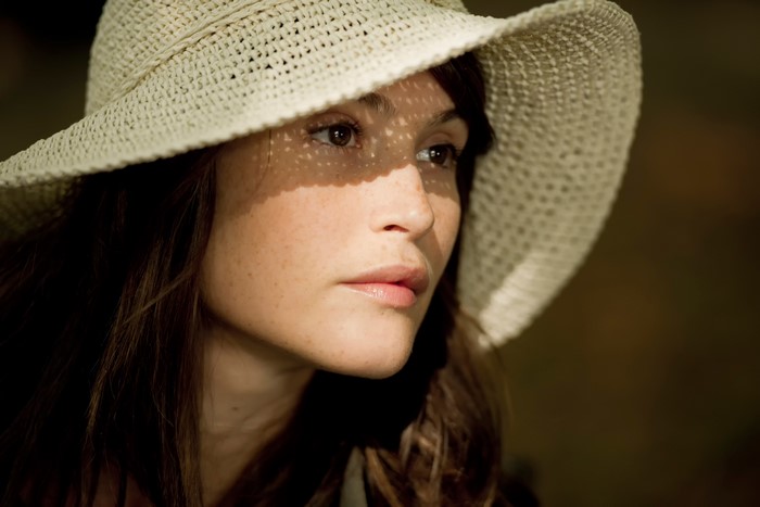 Gemma Arterton wearing a straw hat