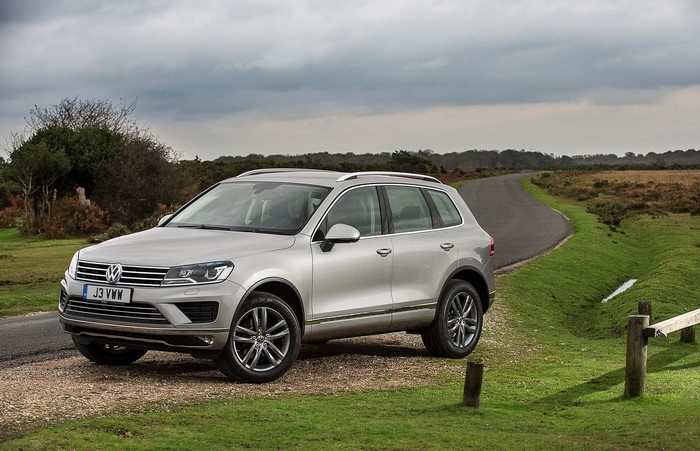 Silver 2014 Volkswagen Touareg SE on a country road