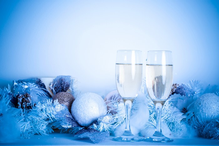 Champagne glasses with Christmas decorations