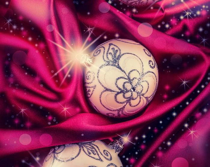 Christmas balls on pink silk