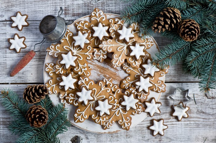 Christmas gingerbread cookies with pine cones and fir branches