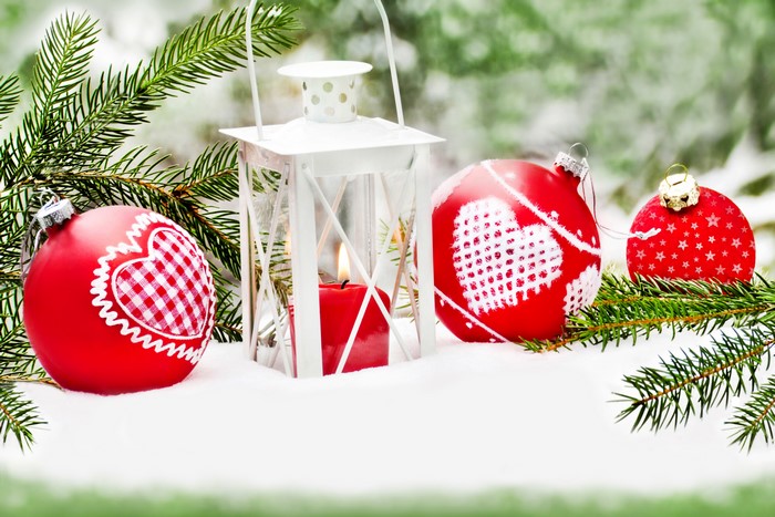 Christmas lantern with ornaments and fir branches