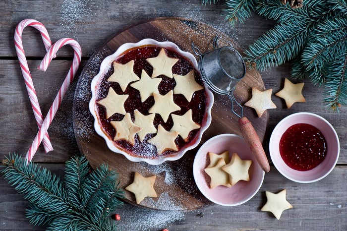 Christmas star cookies with jam and candy canes