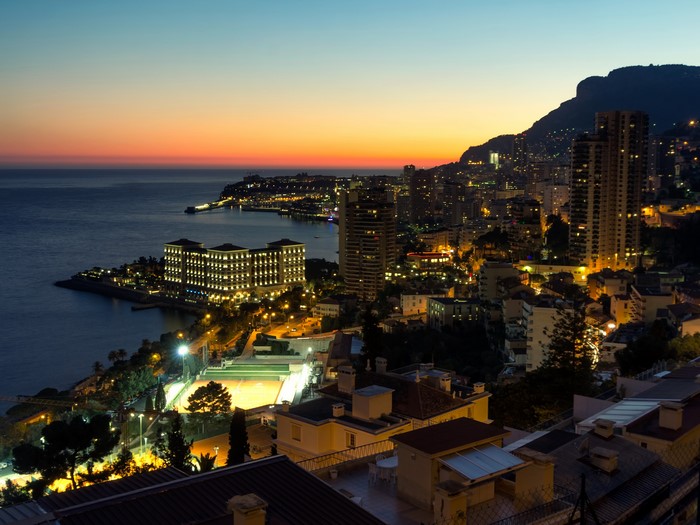 Monaco cityscape at dusk with ocean view
