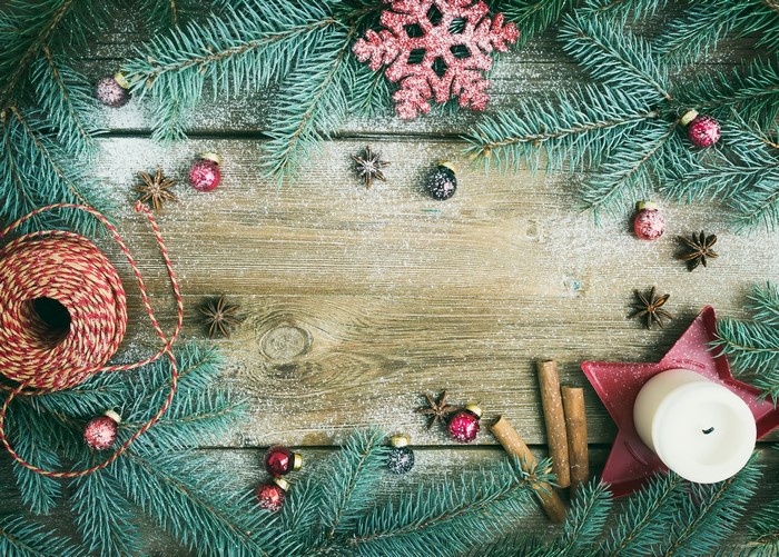 Christmas branches with ornaments and candle