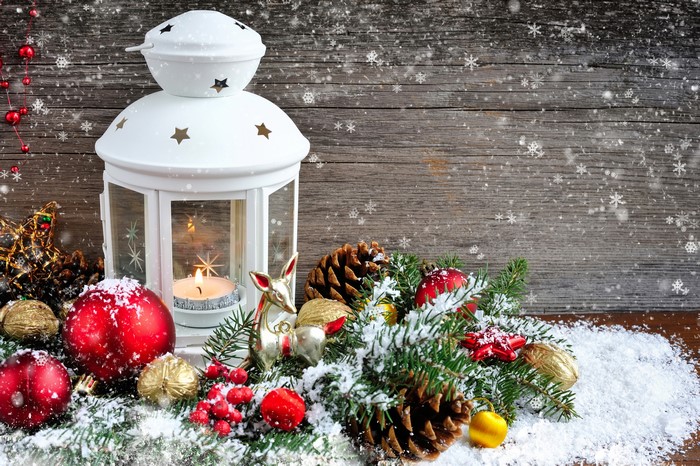 Christmas lantern with ornaments and pine cones