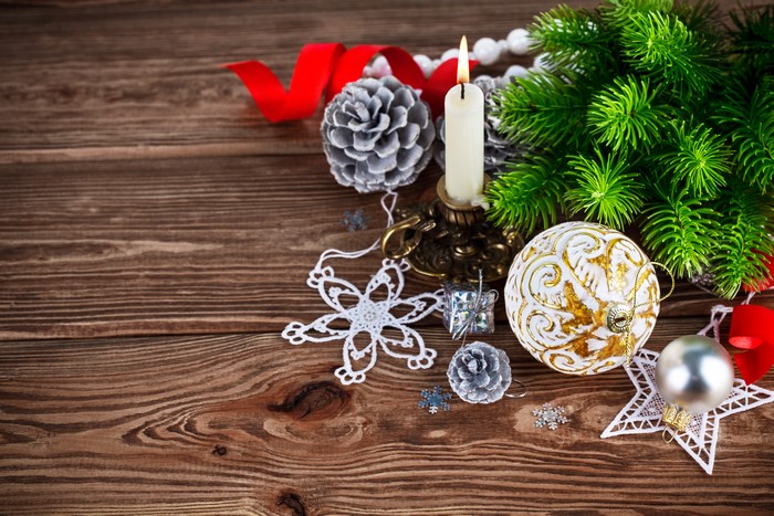 Christmas decorations with candle and pine branches