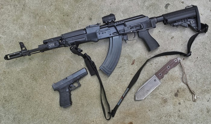 AK-47 rifle, Glock pistol, and combat knife