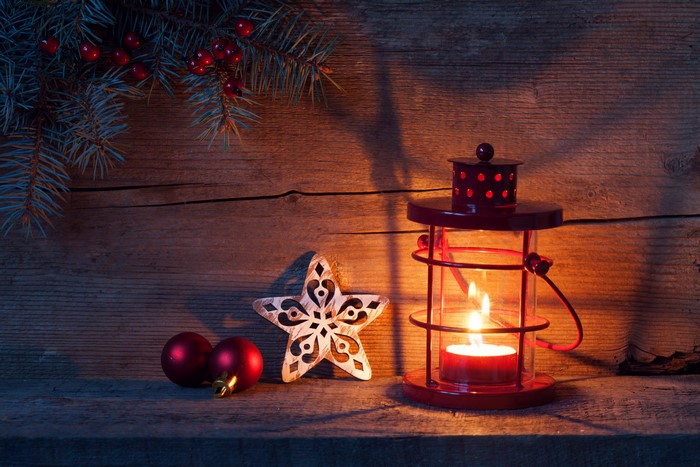Christmas lantern with ornaments and pine branches