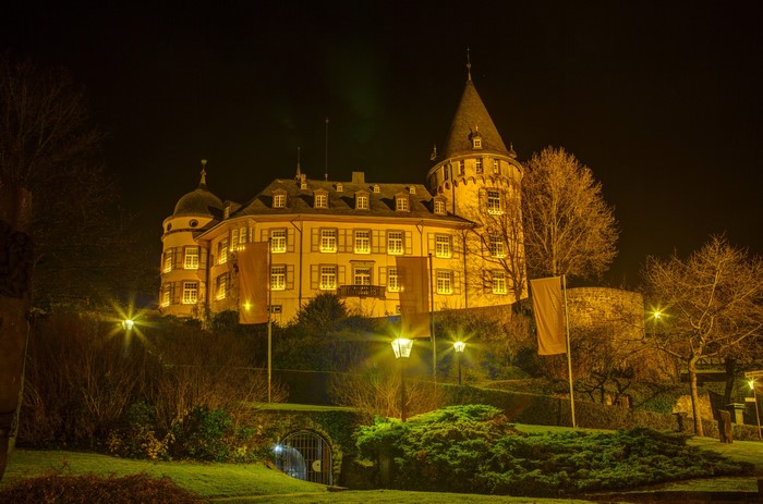 Genovevaburg Castle at night in Germany