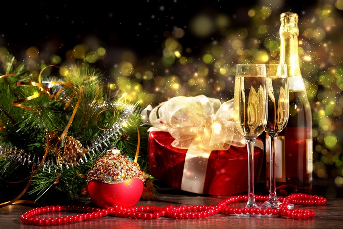 Christmas Champagne and Gifts with Festive Decorations